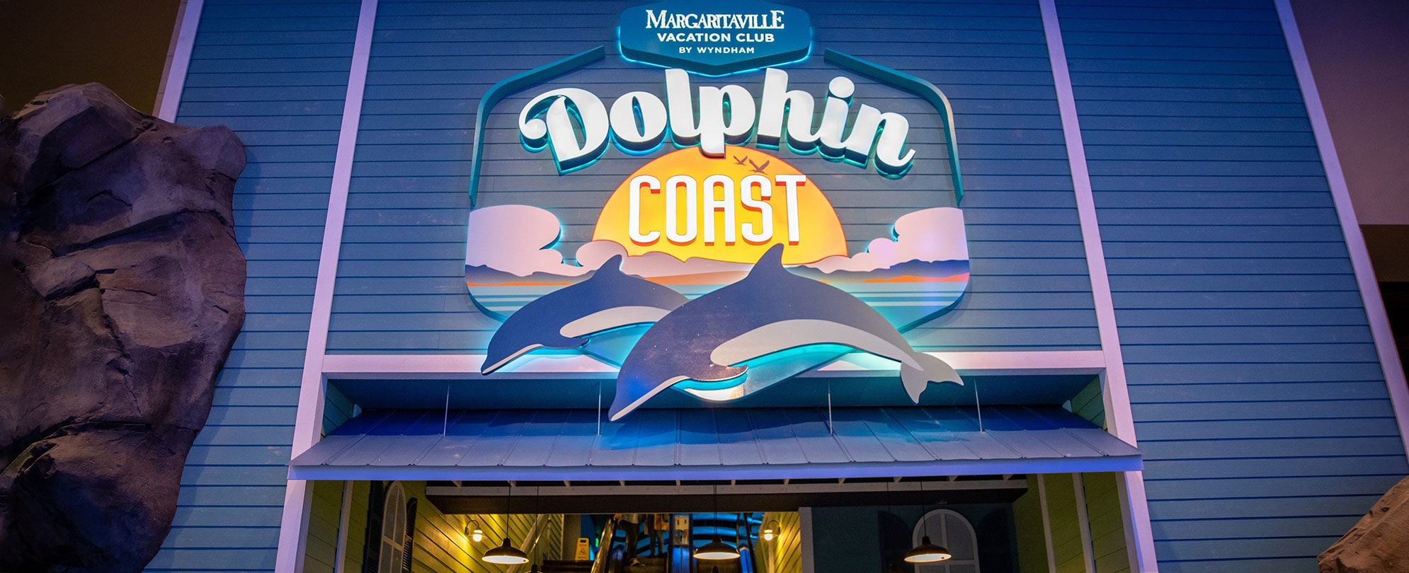 View of the Dolphin Coast Logo on a building